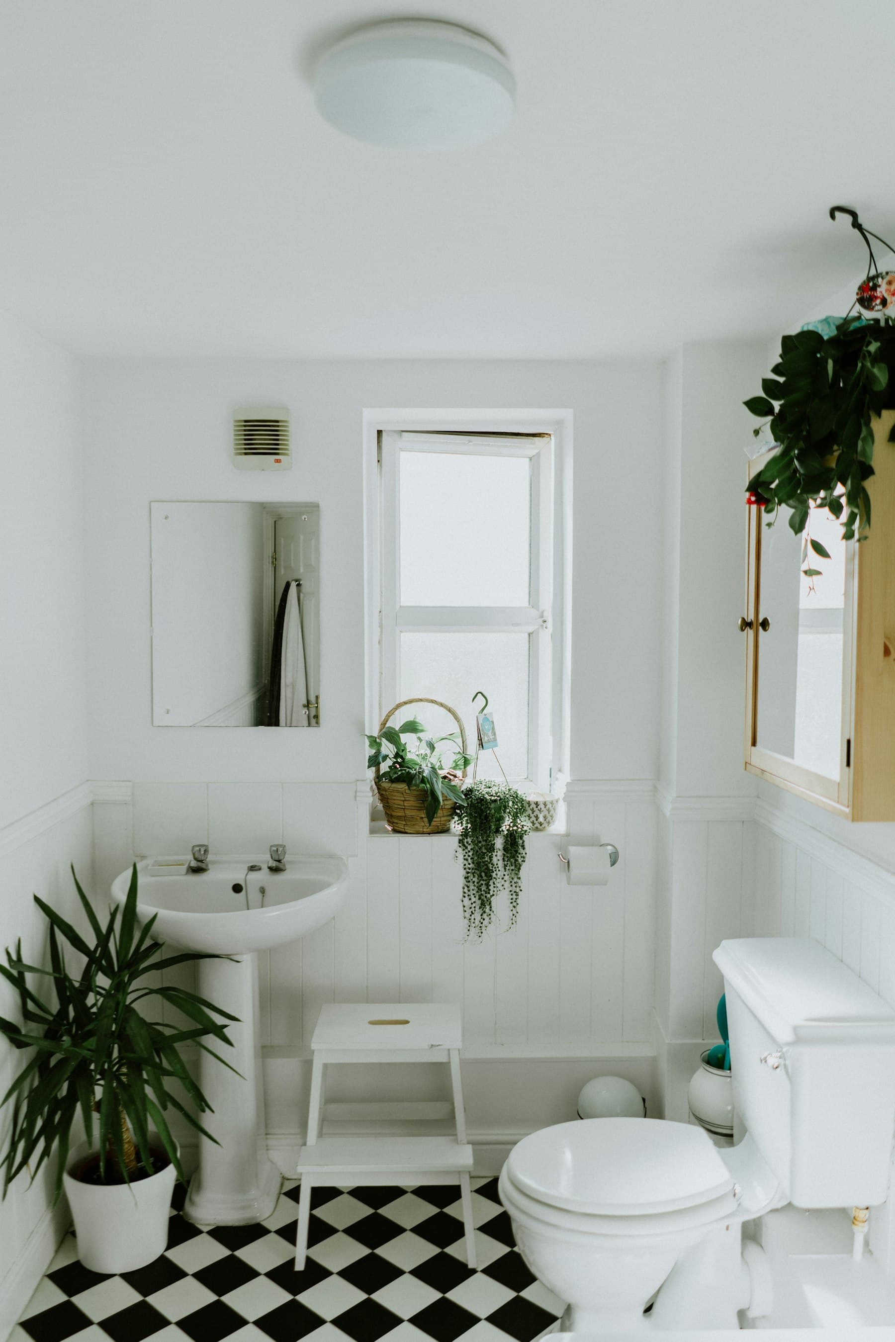 Warm stone bathroom with chrome fittings